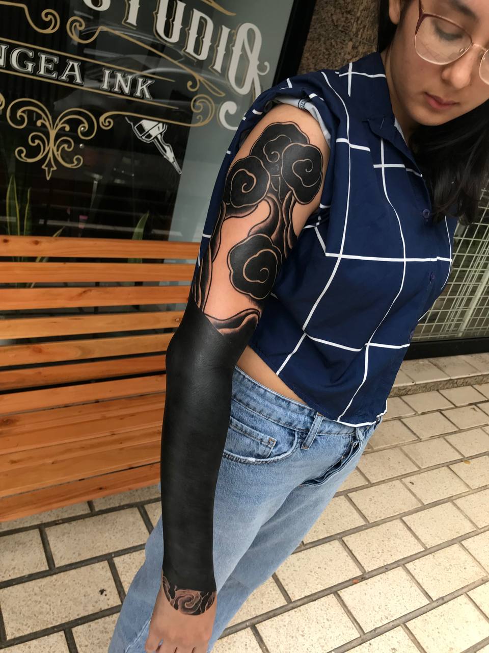 Pangea Ink full blackout sleeve tattoo