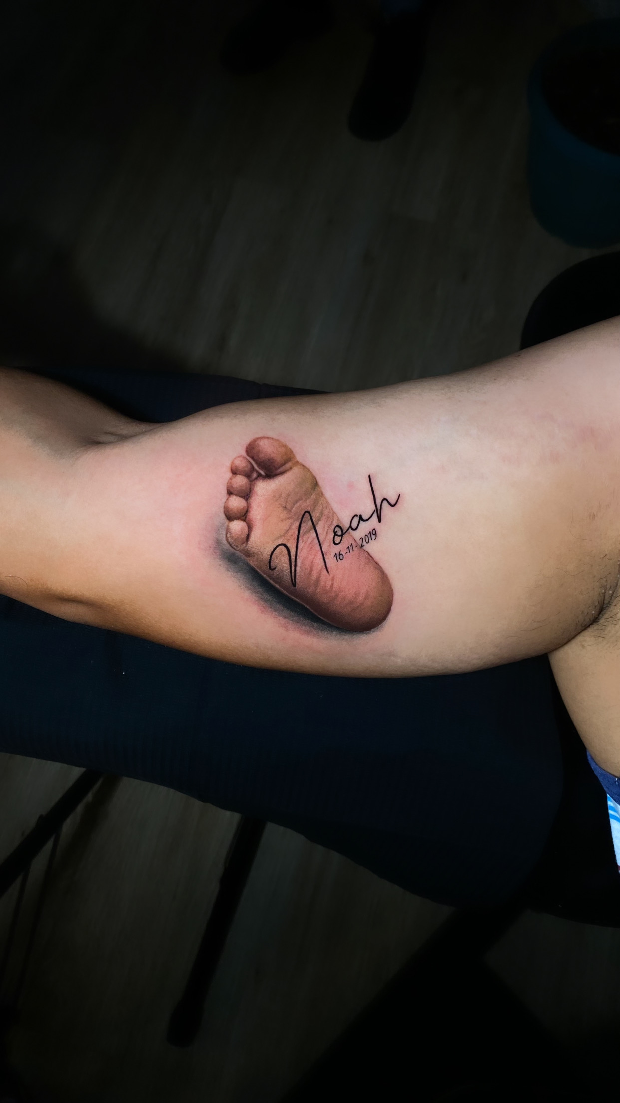 Pangea Ink baby foot realism tattoo