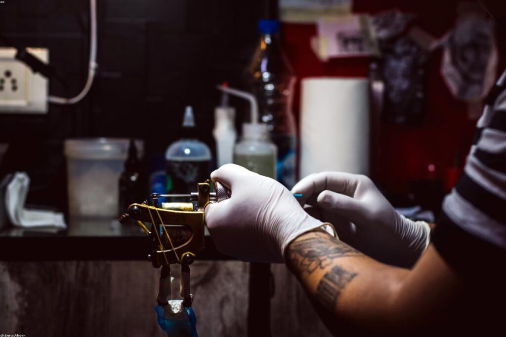 Tattoo studio artist at work