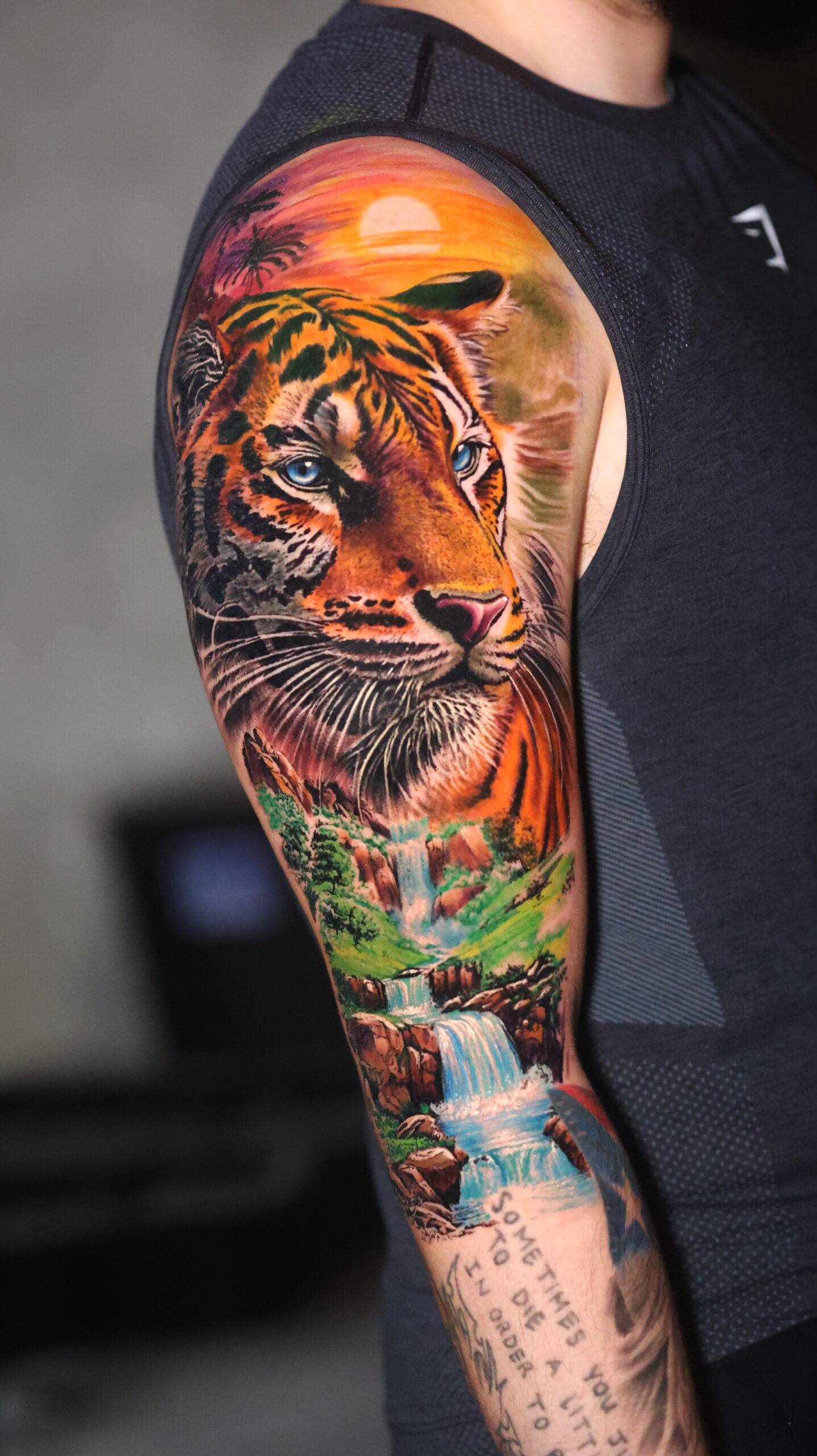 Pangea Ink full color tiger sleeve tattoo